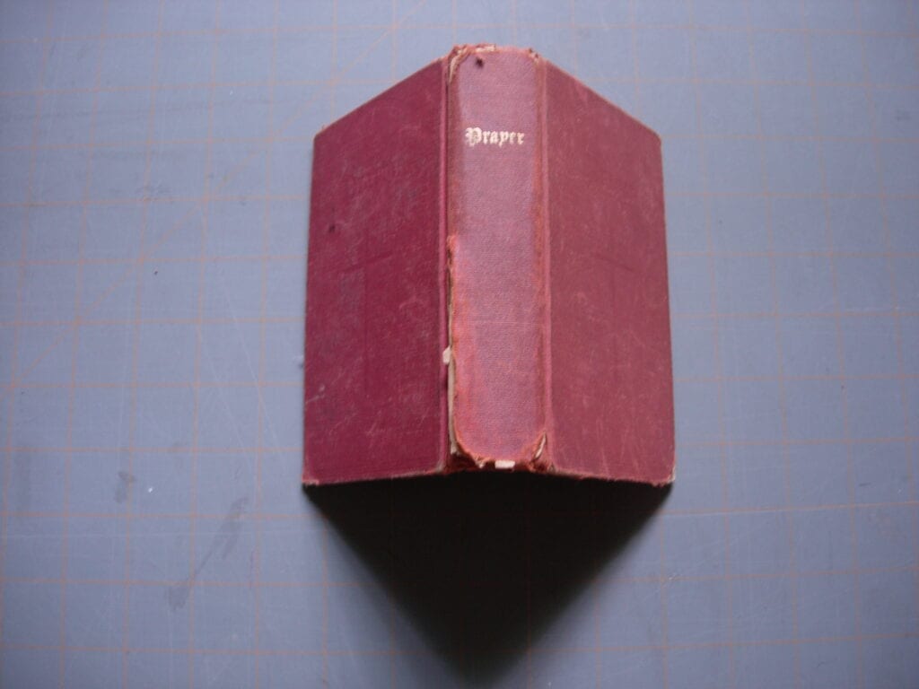 A book is shown with the cover missing.