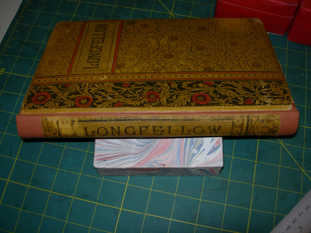 H.W. Longfellow Poems original spine fragment over new spine